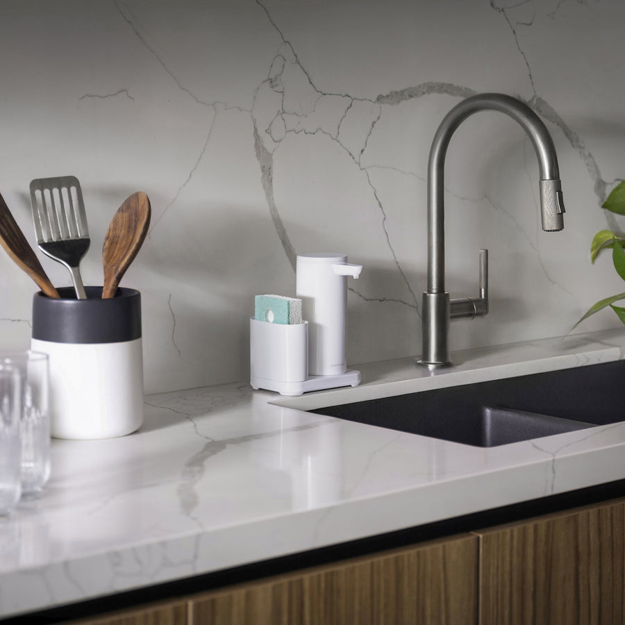 Simplehuman White 9 oz Sensor Pump and Caddy on marble countertop next to sink, touch-free dispensing and organized storage.