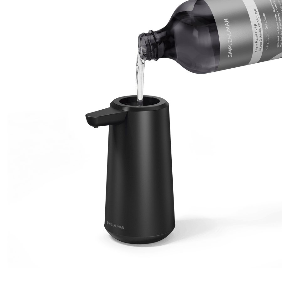 Simplehuman's Refill Bottle filling a Simplehuman Sensor Pump Foam.  